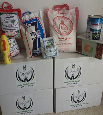 جمعية بللحمر توزع السلات الغذائية للمستفيدين 